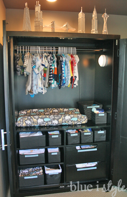 armoire replaces closet for baby changing station, clothes and supplies