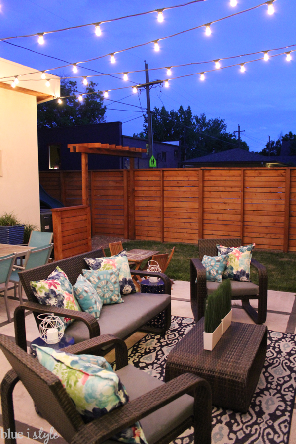 String lights above the patio at dusk