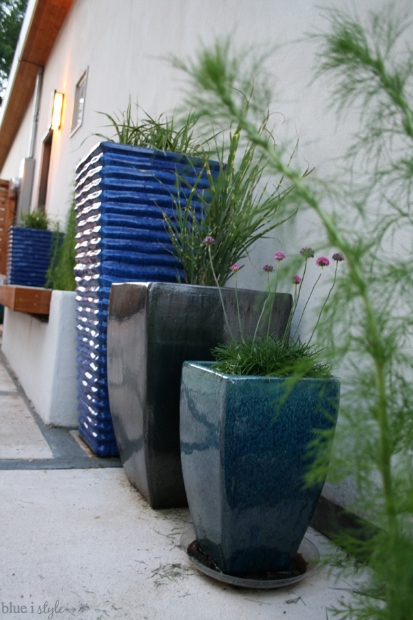 planter bench and blue pots