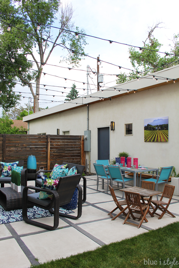 String lights above the patio during the day