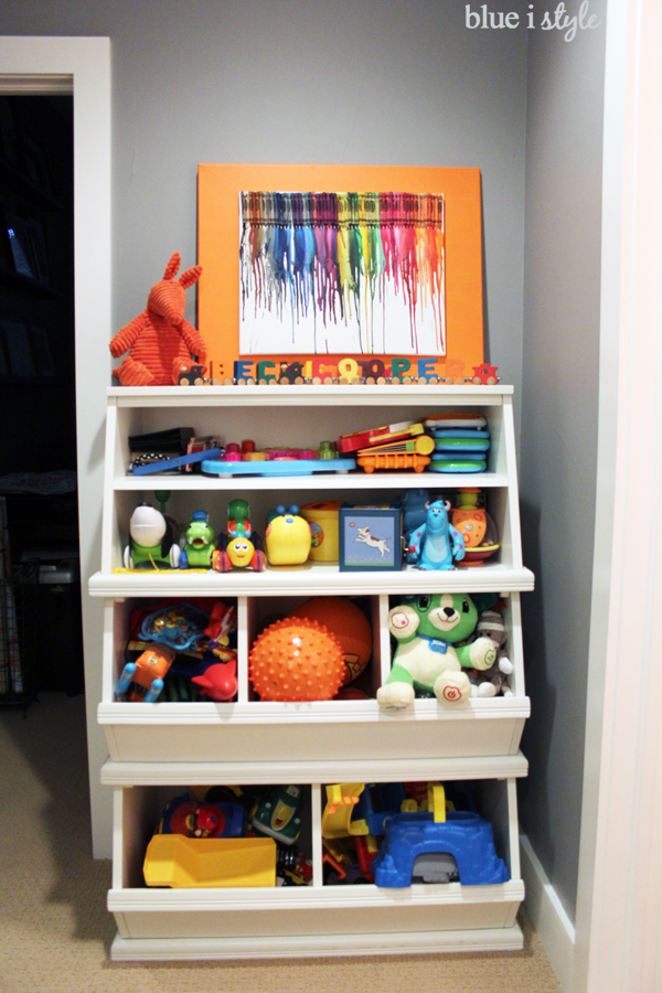 Toys stored in stacking toy bins