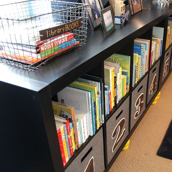 Use bins to organize toys in kids' rooms