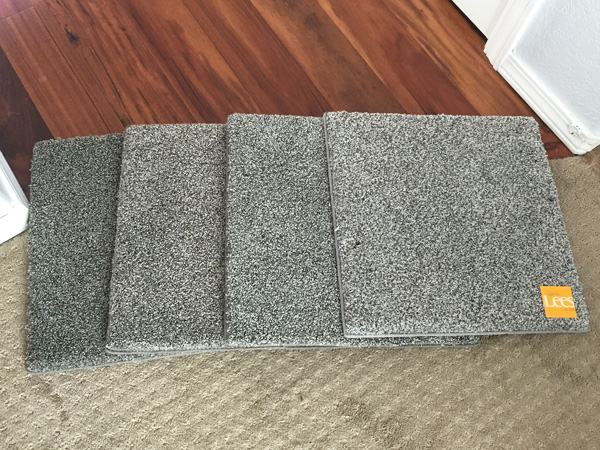 Comparing gray carpet swatches