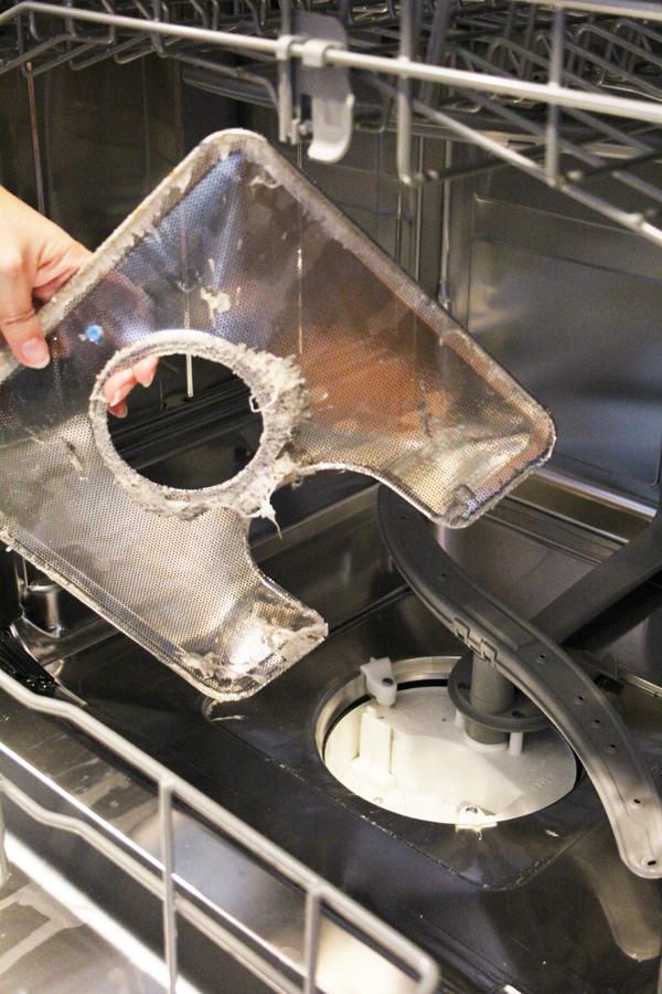 remove and clean dishwasher drain cover