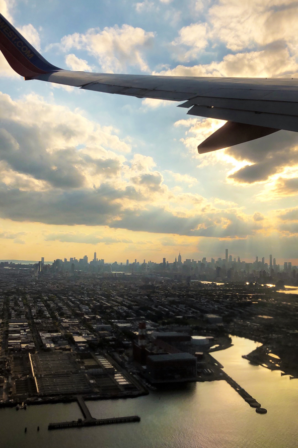 NYC Skyline seen from airplane at sunset