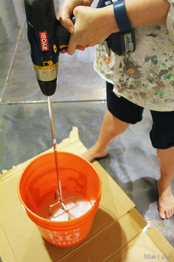 Using paddle mixer to mix anti-slip top coat