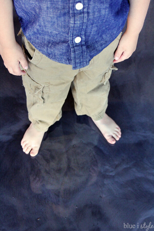 Reflection in gunmetal metallic garage floor