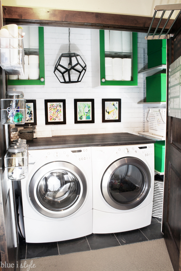 Storage and organization on the back of laundry closet doors