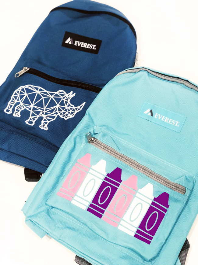 backpacks customized with rhino and crayons on their pockets