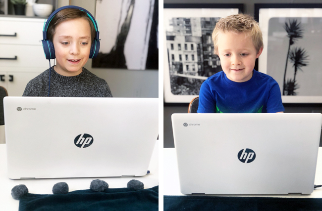 Boys doing school at home on matching Chromebooks