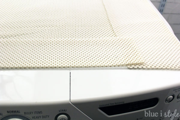 shelf liner under laundry room countertop to stop it from sliding