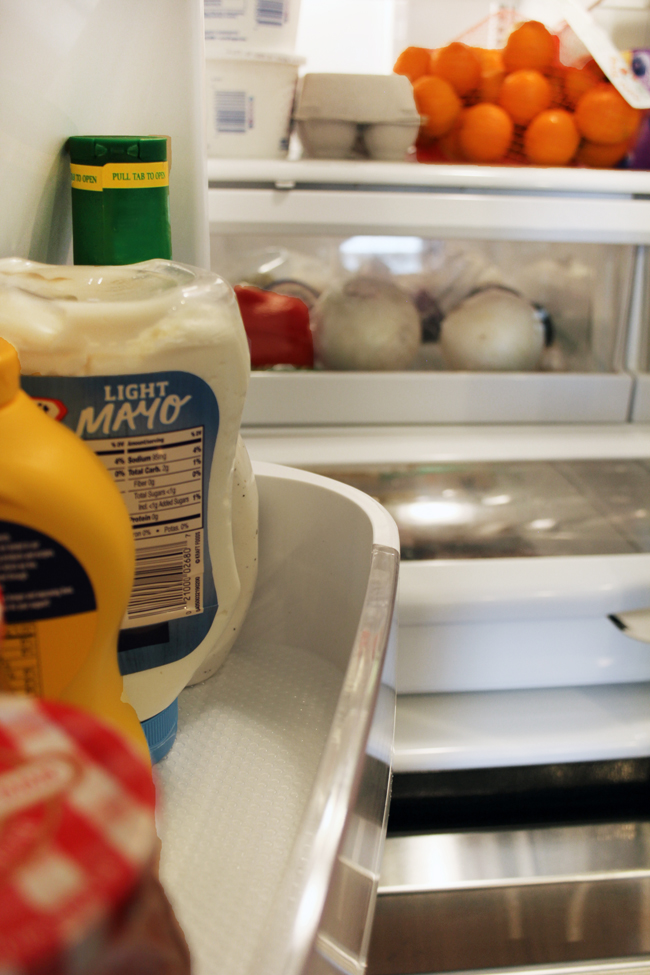 Shelf liner in fridge door bins