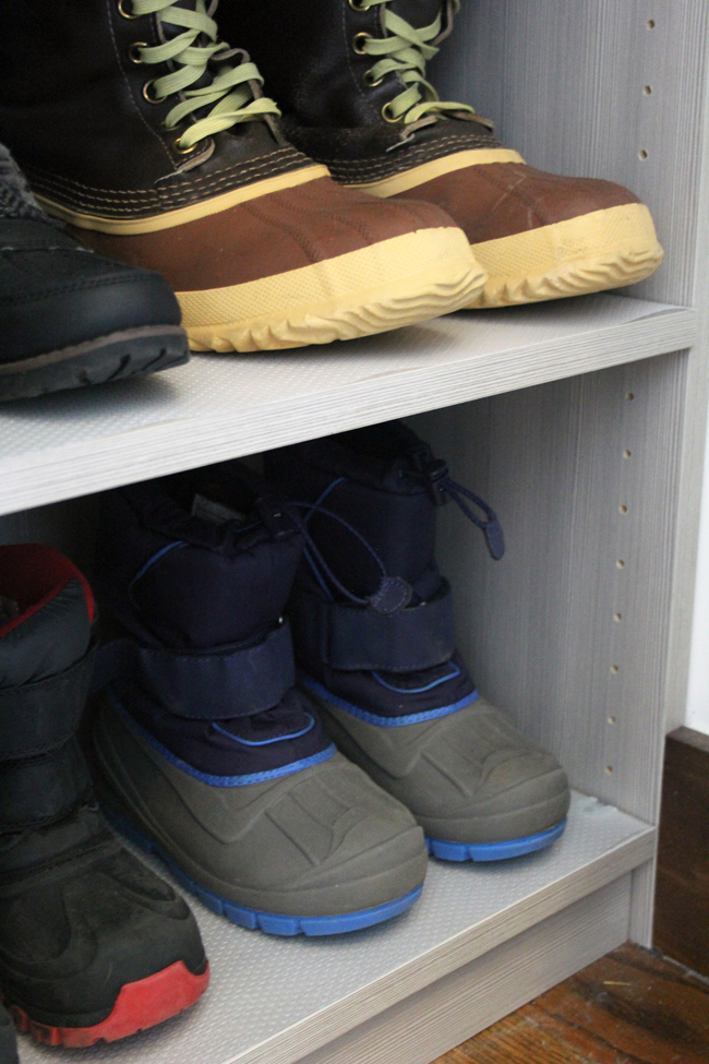 shelf liner under boots on coat closet shelves