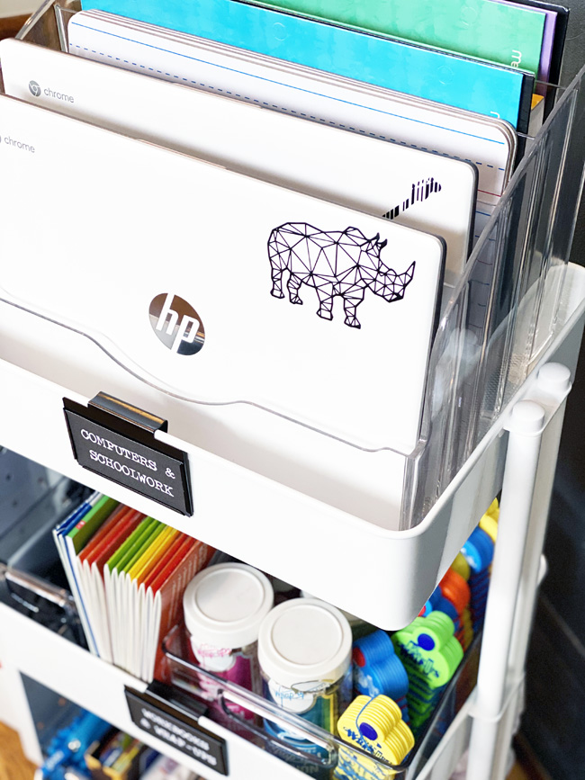 Close up of chromebooks in acrylic file sorter