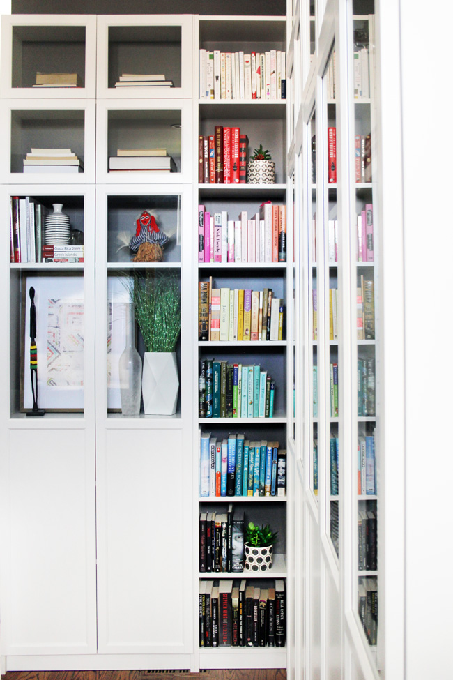 White Billy Bookcases in corner with glass doors